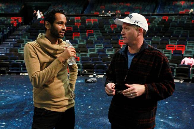 Creative director Mukhtar O.S. Mukhtar talks with acrobatic coach Dan Niehaus during rehearsals for the upcoming Cirque du Soleil benefit "One Night | One Drop" Thursday, March 6, 2014 at the MJ One theater at Mandalay Bay.